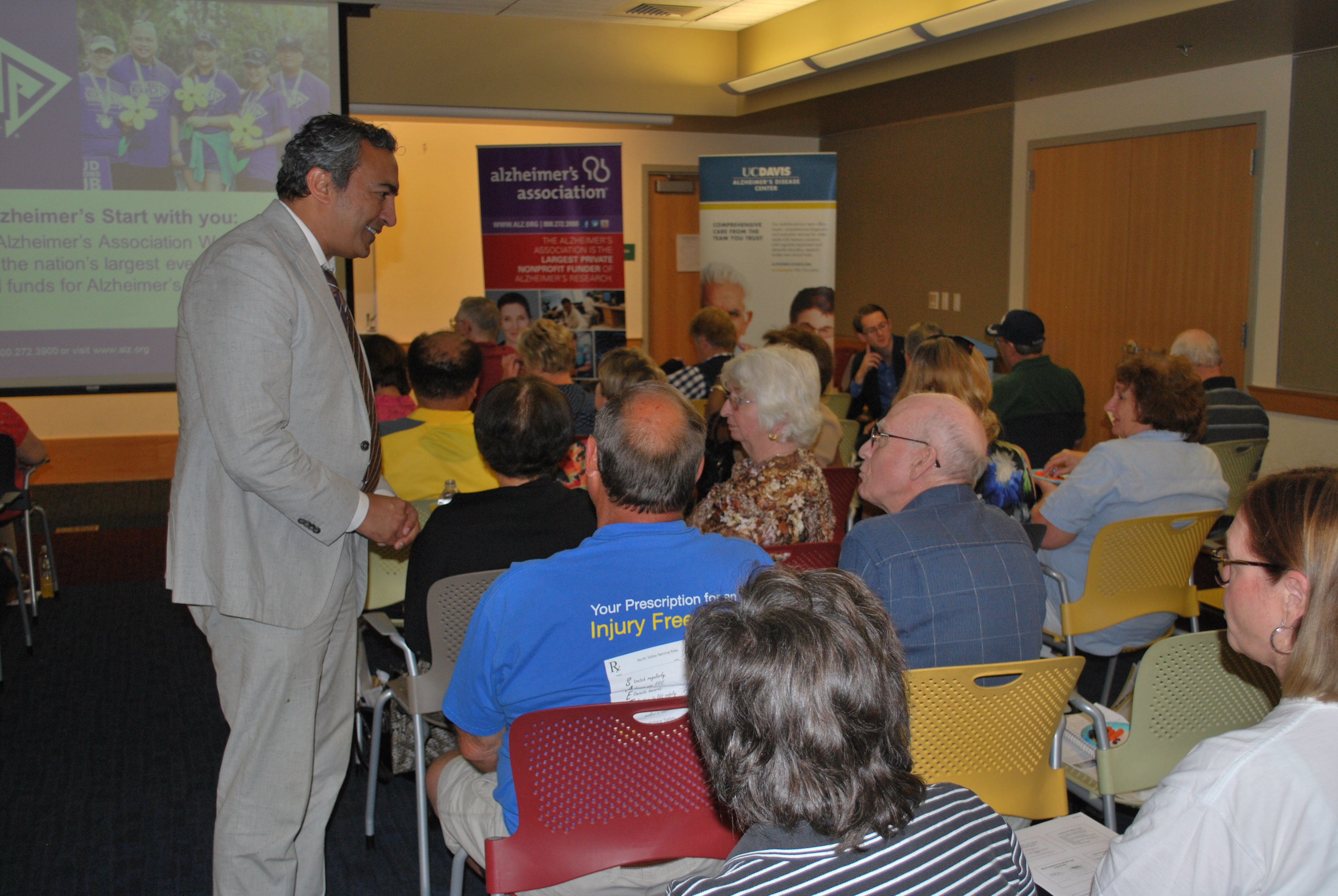 Rep. Bera speaking with attendees at his Brain Health Forum in June for National Alzheimer's Awareness Month